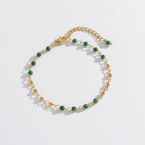 Minimalist gold chain bracelet featuring green malachite-pattern beads and lobster clasp