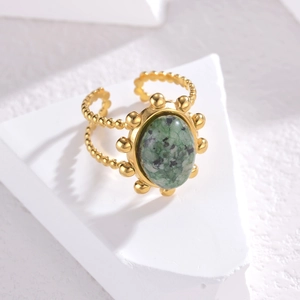 Vintage gold stainless steel ring with oval green stone and beaded texture detail