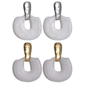 Minimalist geometric earrings in gold and silver finish with white resin horseshoe charms