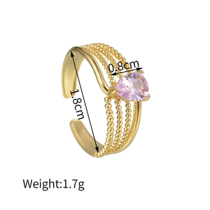 Anello regolabile in oro con zircone rosa a goccia e fascia a tre strati di perline