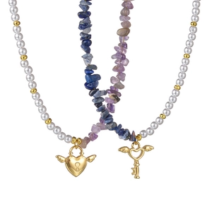 Double-layered necklace with pearl chain, heart lock pendant and stone beaded key necklace