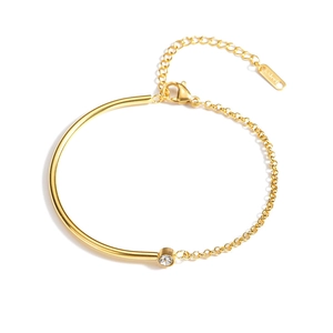 Gold stainless steel bracelet with zircon inlay and half-rigid geometric design