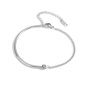 Detail of silver stainless steel bracelet with zircon inlay and lobster clasp closure