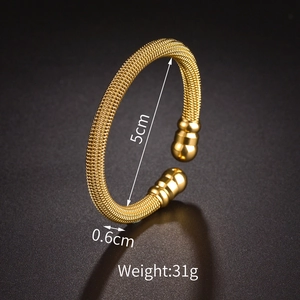 Detailed view of woven texture stainless steel cuff bangle with 5cm inner diameter size