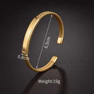Detailed view of gold twisted cable bracelet showing 6.5cm inner diameter and 19g weight