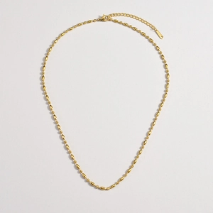Minimalist golden beaded necklace with polished oval olive beads and adjustable clasp
