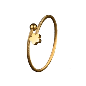 Minimalist gold stainless steel twisted rope open bangle with floral and bead charms