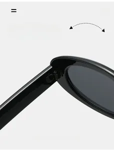 Macro detail of the durable metal hinge on retro oval black sunglasses frame