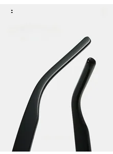 Detail of ergonomic curved temples on vintage oval sunglasses for comfortable daily wear