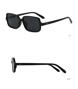 Detail views of classic black square sunglasses with side metal studs at 45 degree angle