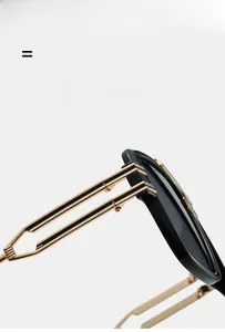 Close-up of golden metal temples and hinges on black oversized square sunglasses