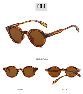 Detailed views of vintage round tortoise shell sunglasses with dark brown lenses
