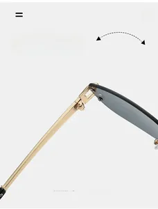 Macro detail of the durable texture hinge on minimalist rimless hip-hop sunglasses