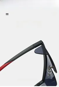 Detail of red and black dual-tone eyewear frame with flexible hinges and nose pads