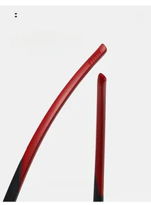 Close-up of red and black curved sunglasses temples with anti-slip texture detail