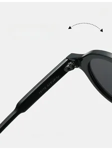 Macro detail of high-quality metal hinge and model specs on vintage round sunglasses
