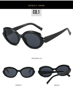 Detail view of futuristic wrap-around sunglasses with black frames and gray lenses