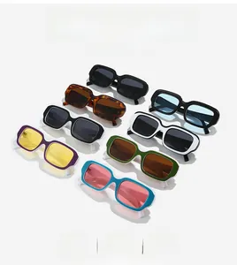 Flat lay of retro rectangular sunglasses in eight assorted color styles and finishes