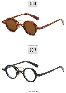 Detail view of octagon sunglasses featuring tortoise and black frames with gold bridge