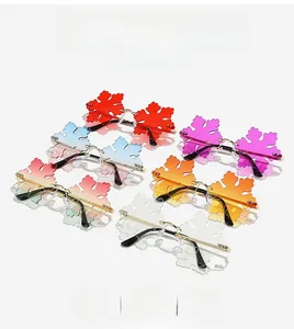 Detail showing colorful rimless leaf-shaped party sunglasses in six gradient colors