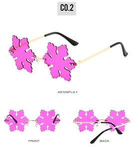 Three-angle view of rose pink snowflake-shaped rimless sunglasses with gold metal temples