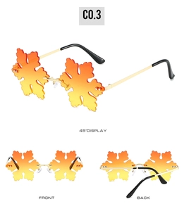 Three perspectives showing maple leaf sunglasses with orange lenses and golden frames