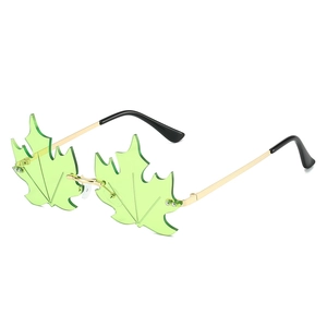 Frameless rimless maple leaf sunglasses with green lenses and gold metal frame for parties