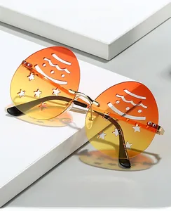 Detail of 2025 snowman themed sunglasses with orange gradient lenses and cutout design