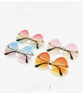 Flat lay of four gradient colored Easter egg sunglasses with festive star patterns