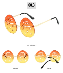Three-angle view of creative snowman sunglasses with orange gradient cutout lenses