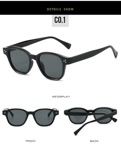 Detail view of black vintage square sunglasses with silver dot accents and dark lenses