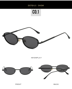 Détail de lunettes de soleil ovales rétro avec monture fine en métal et verres gris