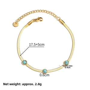 Detail view of gold snake chain bracelet with turquoise stones and size measurements