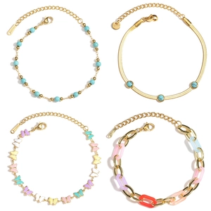 Set of minimalist stainless steel gold bracelets with butterfly charms and turquoise beads