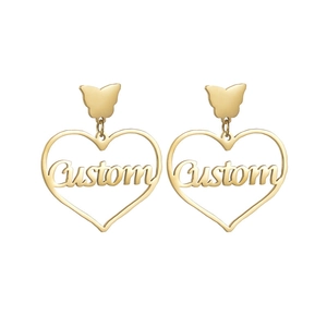 Custom heart drop earrings in gold stainless steel with personalized name cutout