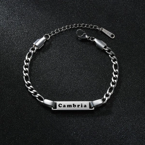 Custom silver stainless steel Figaro ID bracelet with engraved Cambria nameplate