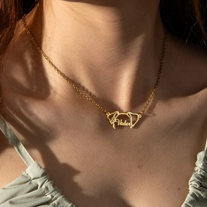 Minimalist gold stainless steel necklace with Vader name and dog silhouette pendant