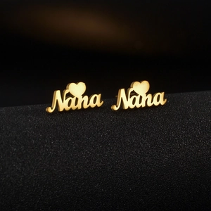 Personalized golden Nana name earrings with heart detail in polished stainless steel