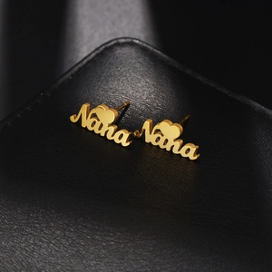 Custom Nana name stud earrings in polished gold stainless steel with heart accent
