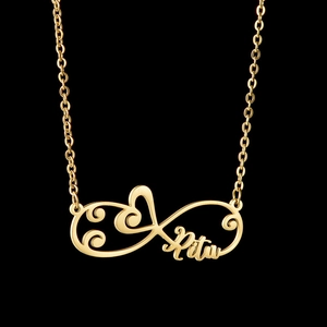 Gold stainless steel infinity heart necklace with custom name Ritu on black background