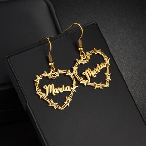 Golden heart-shaped Maria name earrings with barbed wire design on black leather case