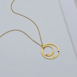 Custom stainless steel double interlocking ring necklace with personalized names and gems