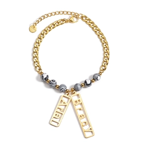 Custom gold stainless steel cuban chain bracelet with Arial and Bracy nameplates