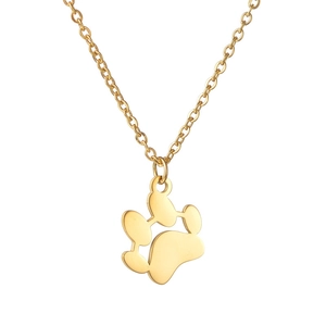 Macro shot of minimalist gold necklace with cute hollow-out animal paw print pendant