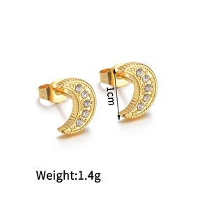 Detail of owl-inspired 18K gold crescent stud earrings with weight and size markers