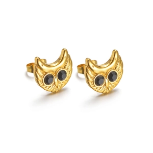 Macro detail of owl stud earrings with 18K gold finish and sparkling black stone eyes