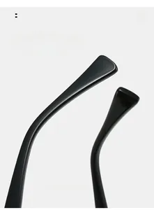 Macro view of curved glossy black sunglasses legs for comfortable summer eyewear wear