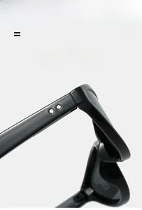 Detail of silver star rivets on the hinge of black cat-eye sunglasses with metal accents