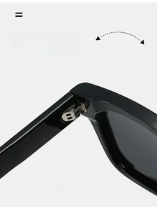 Detail of durable silver metal hinge on luxury square black polarized sunglasses