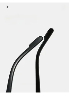 Detailed close-up of curved ergonomic black temples for comfortable sunglasses wear